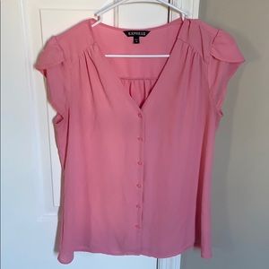 Light pink button up blouse.